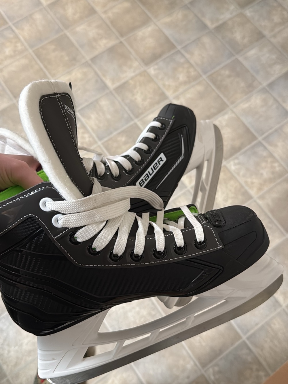 Bauer Black and White Ice Hockey Skates with Green Accents